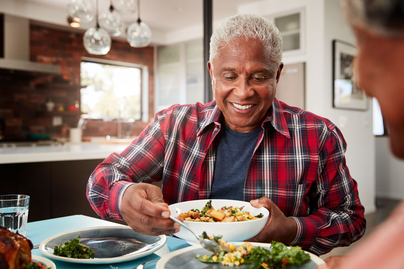 full arch dental implants patient eating